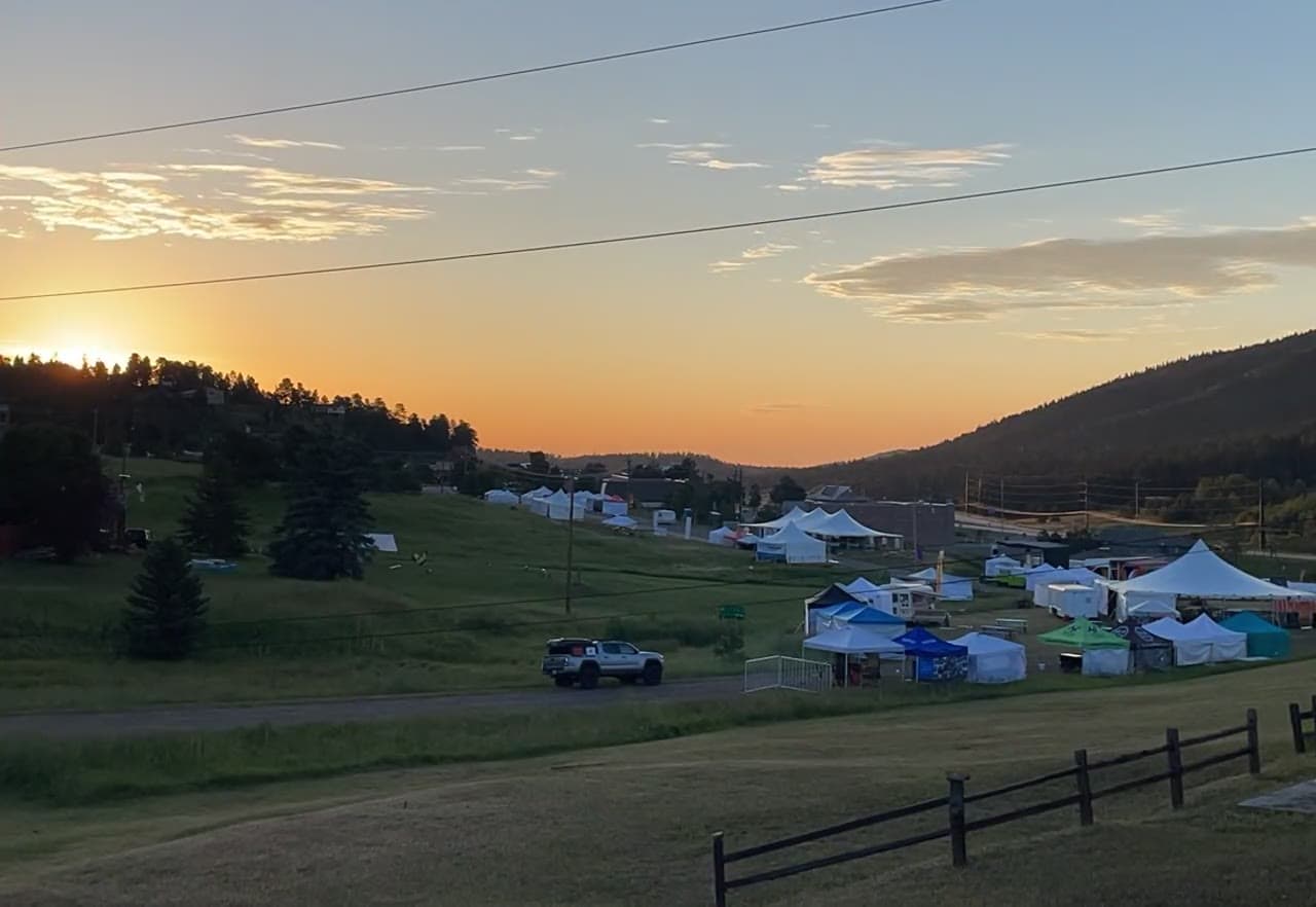 Golden-hour sunset over the Elevation Celebration grounds